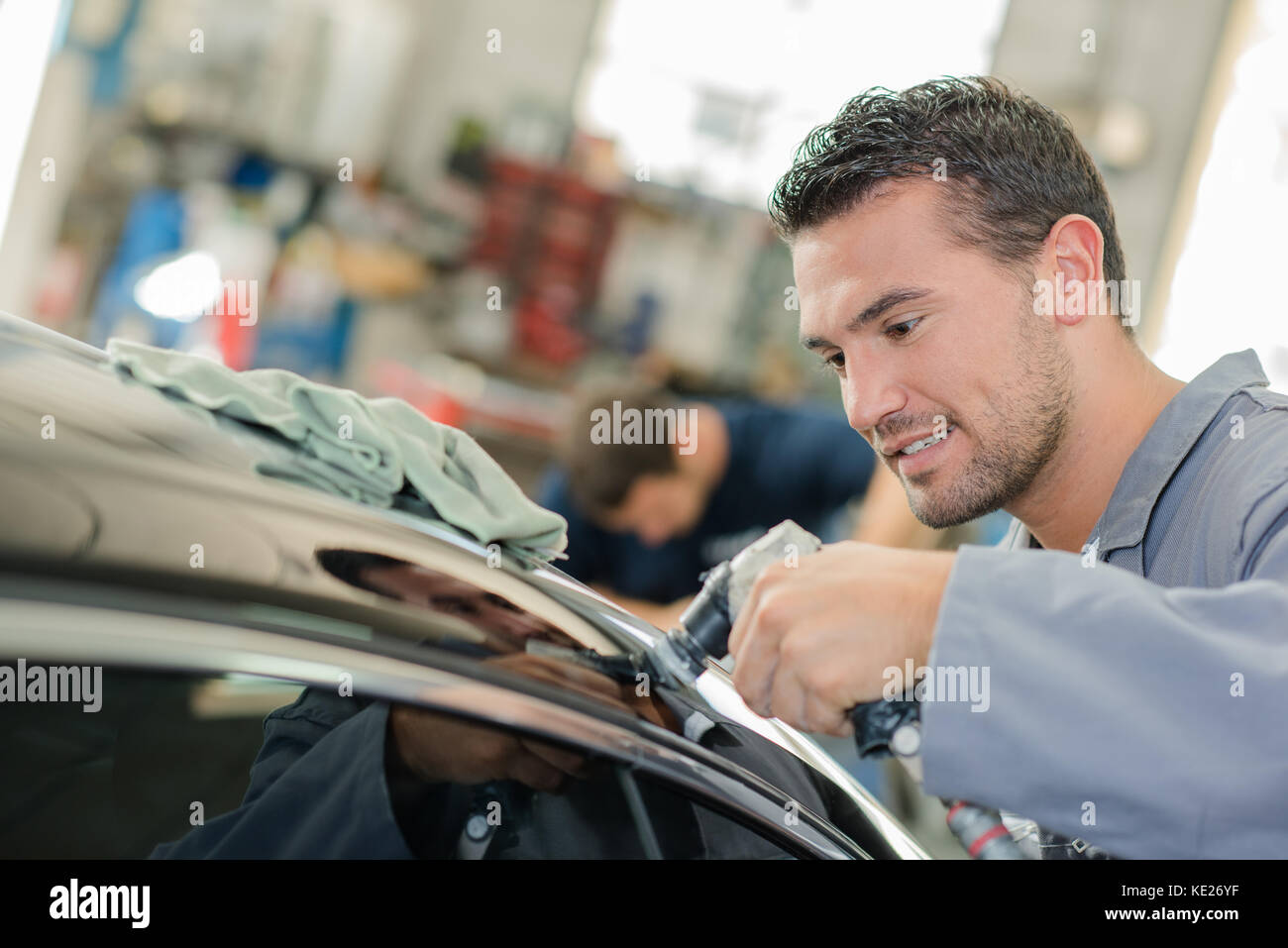 mechanic doing car bodywork Stock Photo
