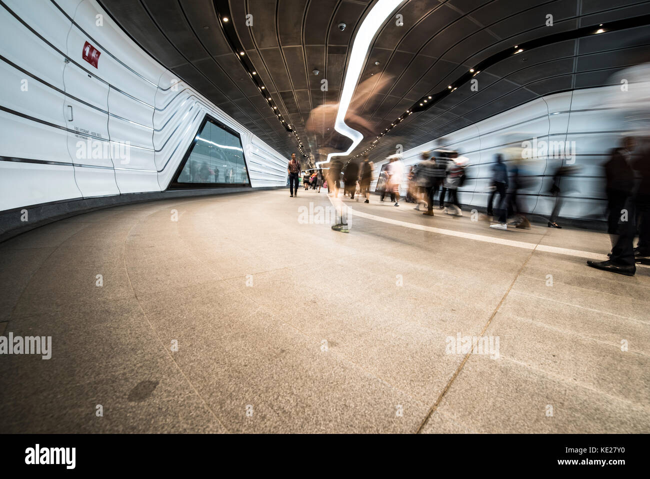 Blurred Pedestrians walking along the new Wynyard Walk from Wynyard train station connecting to Barangaroo, pedestrian walkway, Sydney, NSW, Australia Stock Photo