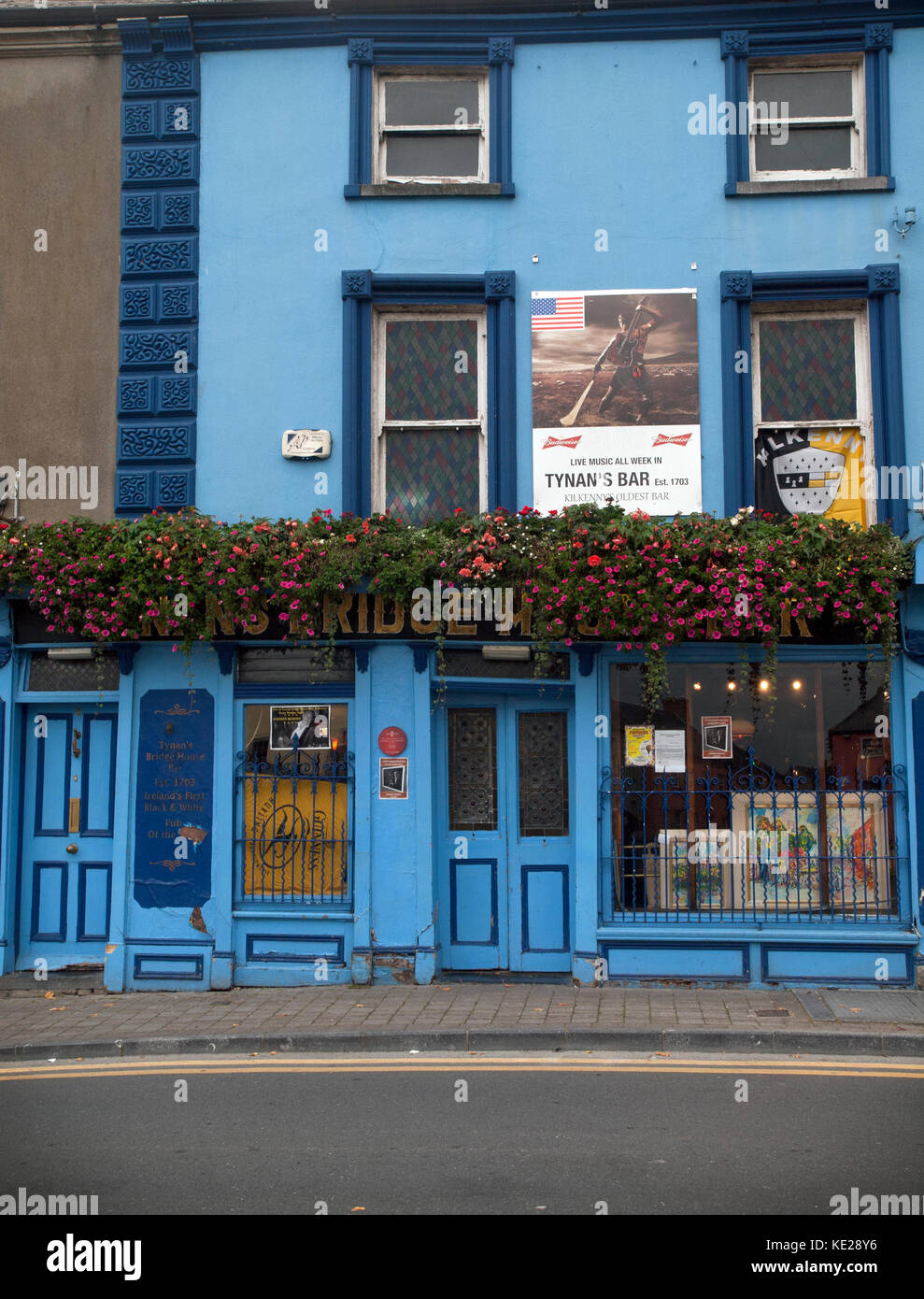 The colorful , brightly painted bars of Kilkenny, Ireland Stock Photo
