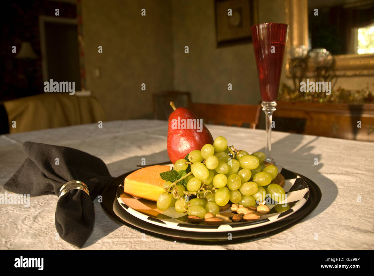 WINE, CHEESE AND FRUIT PLATE Stock Photo
