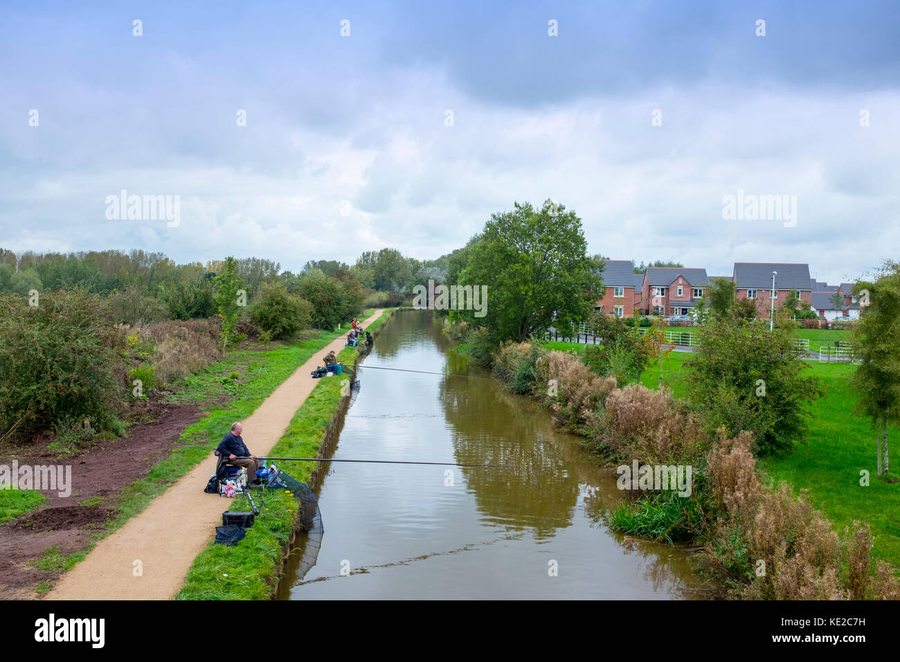Fishing at the Trent and Mersey Canal in Cheshire UK Stock Photo