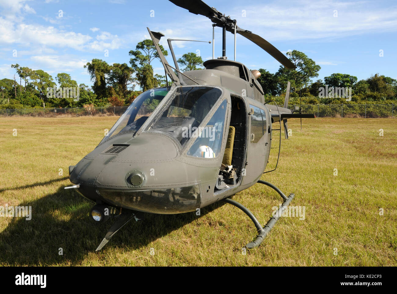 Light helicopter in dark green camouflage color Stock Photo Alamy