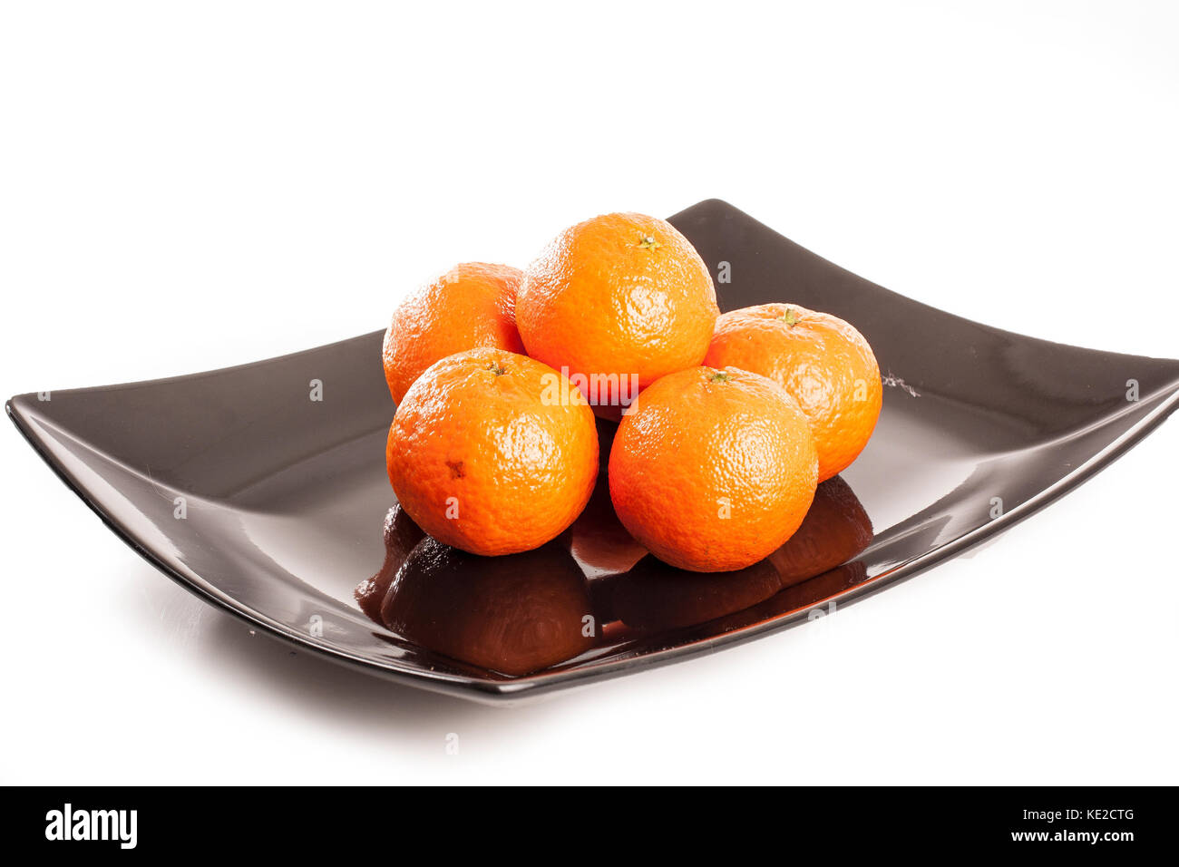 Mandarins mini oranges on white Stock Photo Alamy