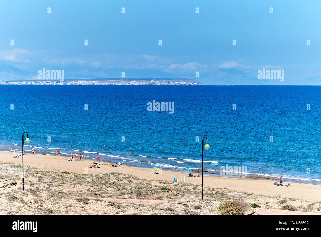 People on the beach of La Mata. Torrevieja city. Costa Blanca, Province of Alicante. Spain Stock Photo