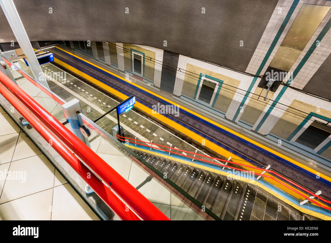 Speeding train passes Blaak underground Train Station in Rotterdam, Netherlands Stock Photo
