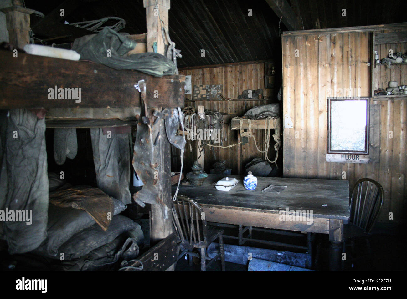 Bunks and wooden table in interior of Captain Scott's hut, McMurdo ...