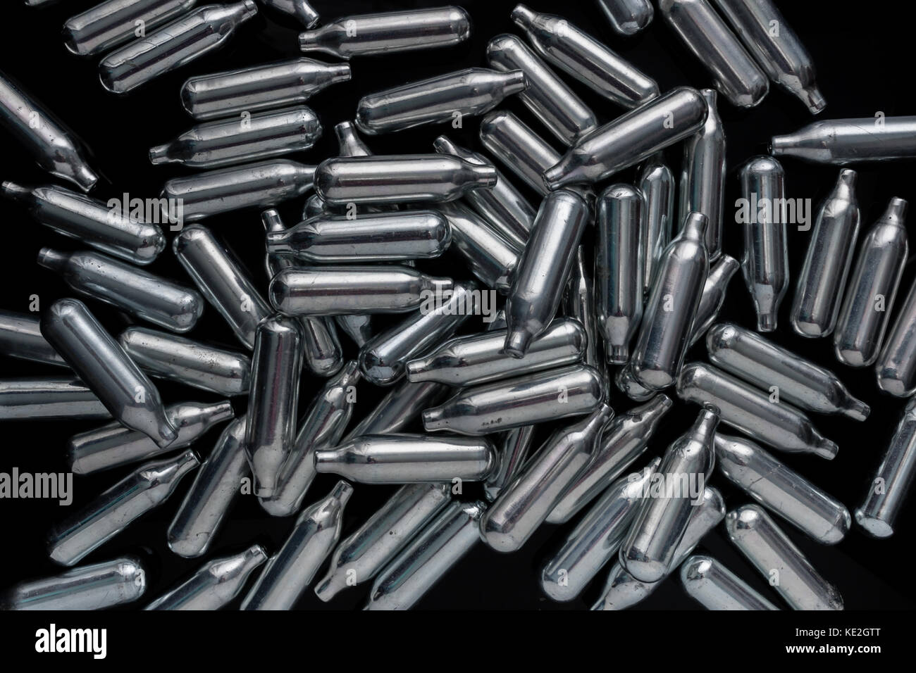 A pile of nitrous oxide canisters gathered from the street. Stock Photo