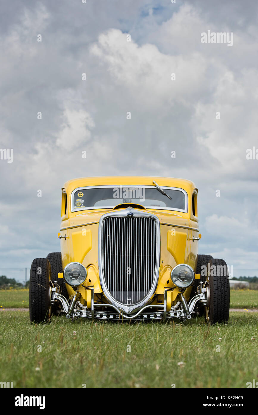 1934 Yellow Ford street rod coupe at an american car show, Essex, England. Classic vintage American car Stock Photo