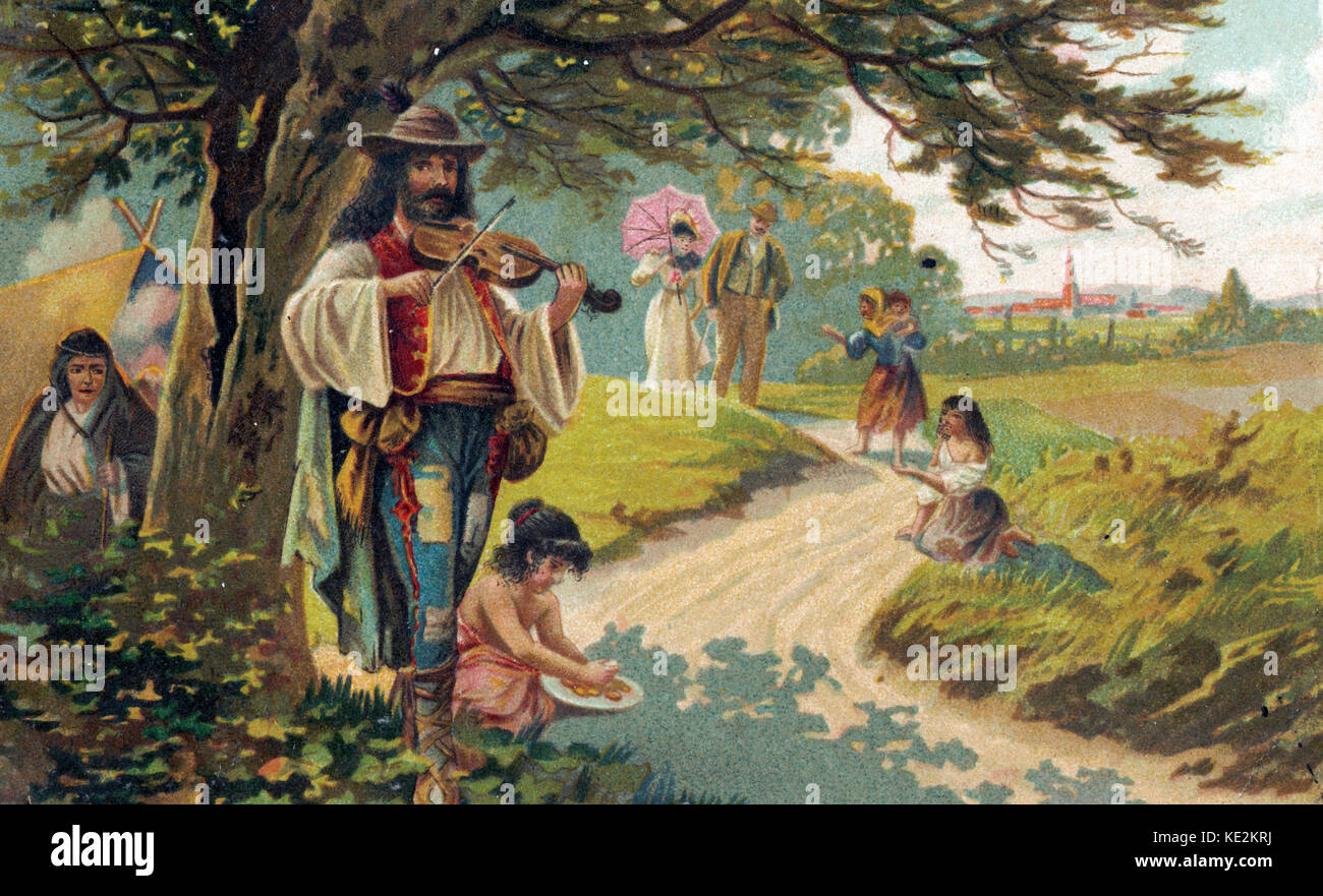 Folk musician/ Gypsy playing violin in countryside. Behind him his tent and wife. Townspeople walking by in background and gypsy children begging. Stock Photo