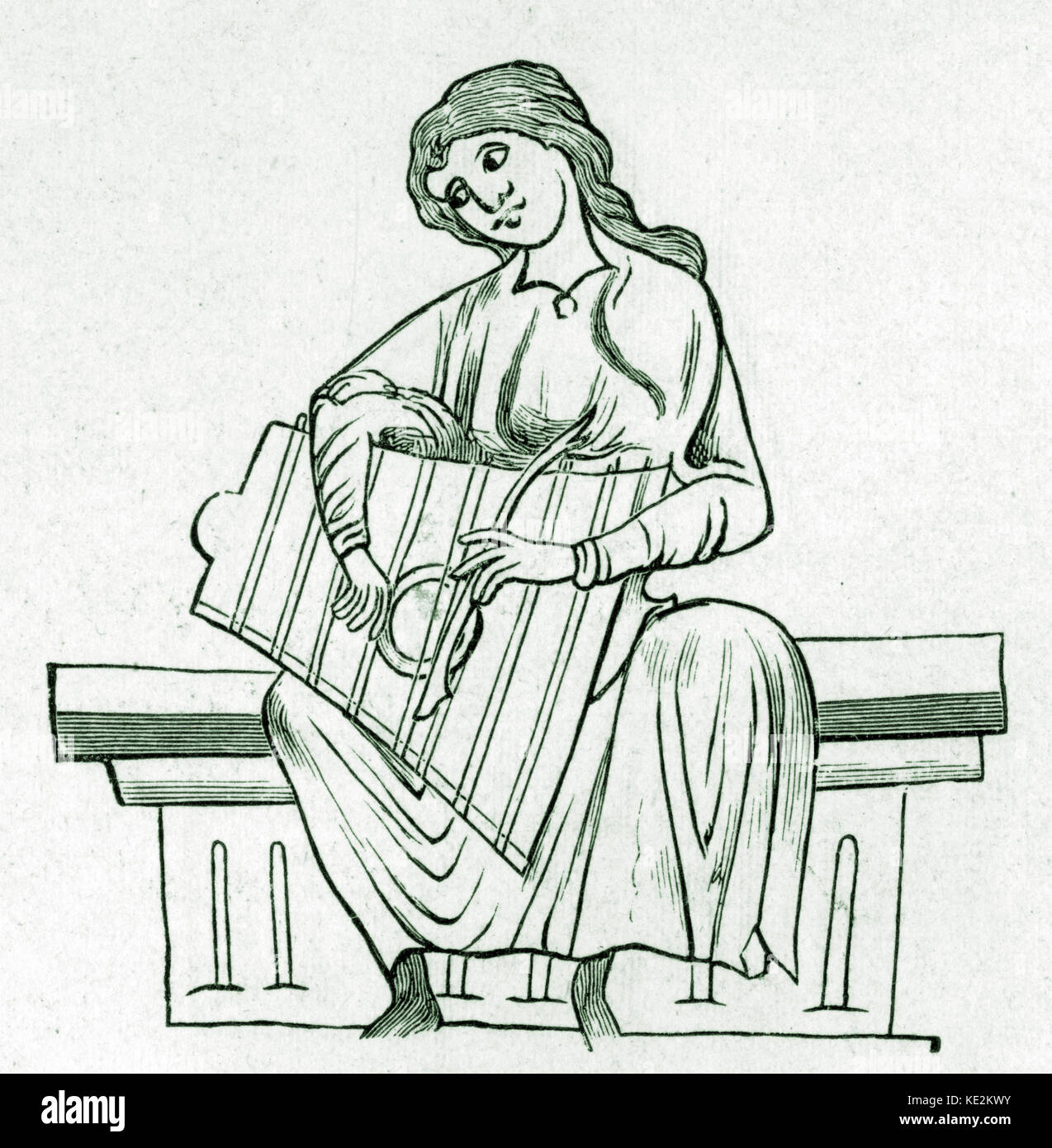 Irish lady playing Psalter, thirteenth century. Stock Photo