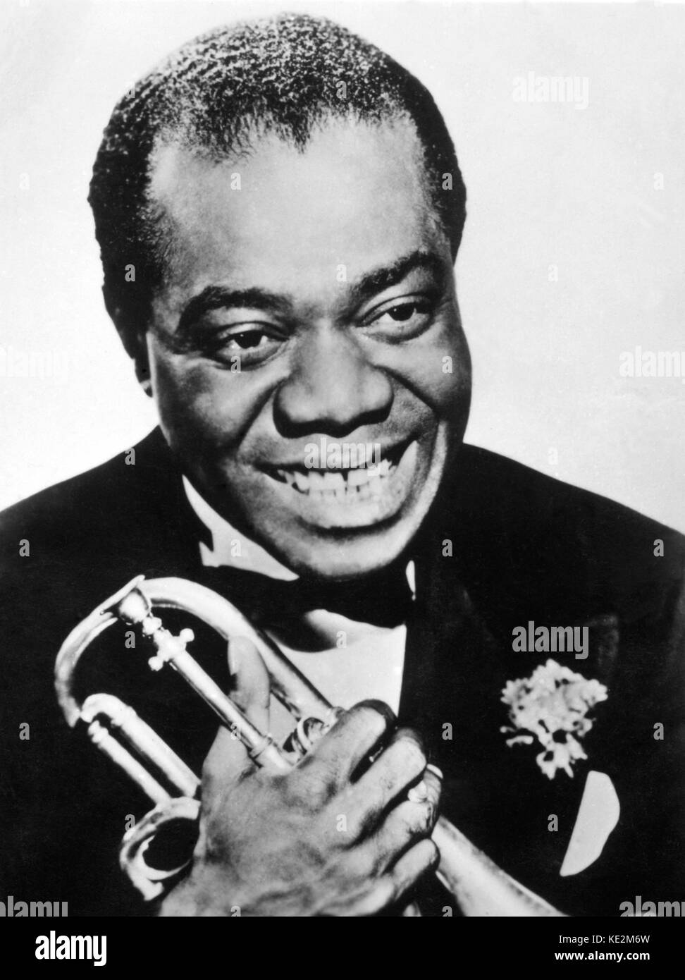 Louis Armstrong - portrait of the American jazz musician holding a trumpet. From the 'Machester Evening News' series. 4 August 1901 - 6 July 1971. Stock Photo