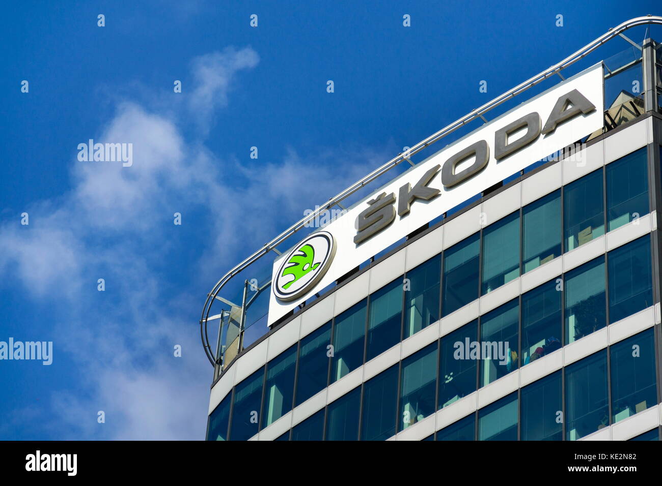 PRAGUE, CZECH REPUBLIC - OCTOBER 14: Skoda Auto automobile manufacturer from Volkswagen Group company logo in front of dealership building on October  Stock Photo