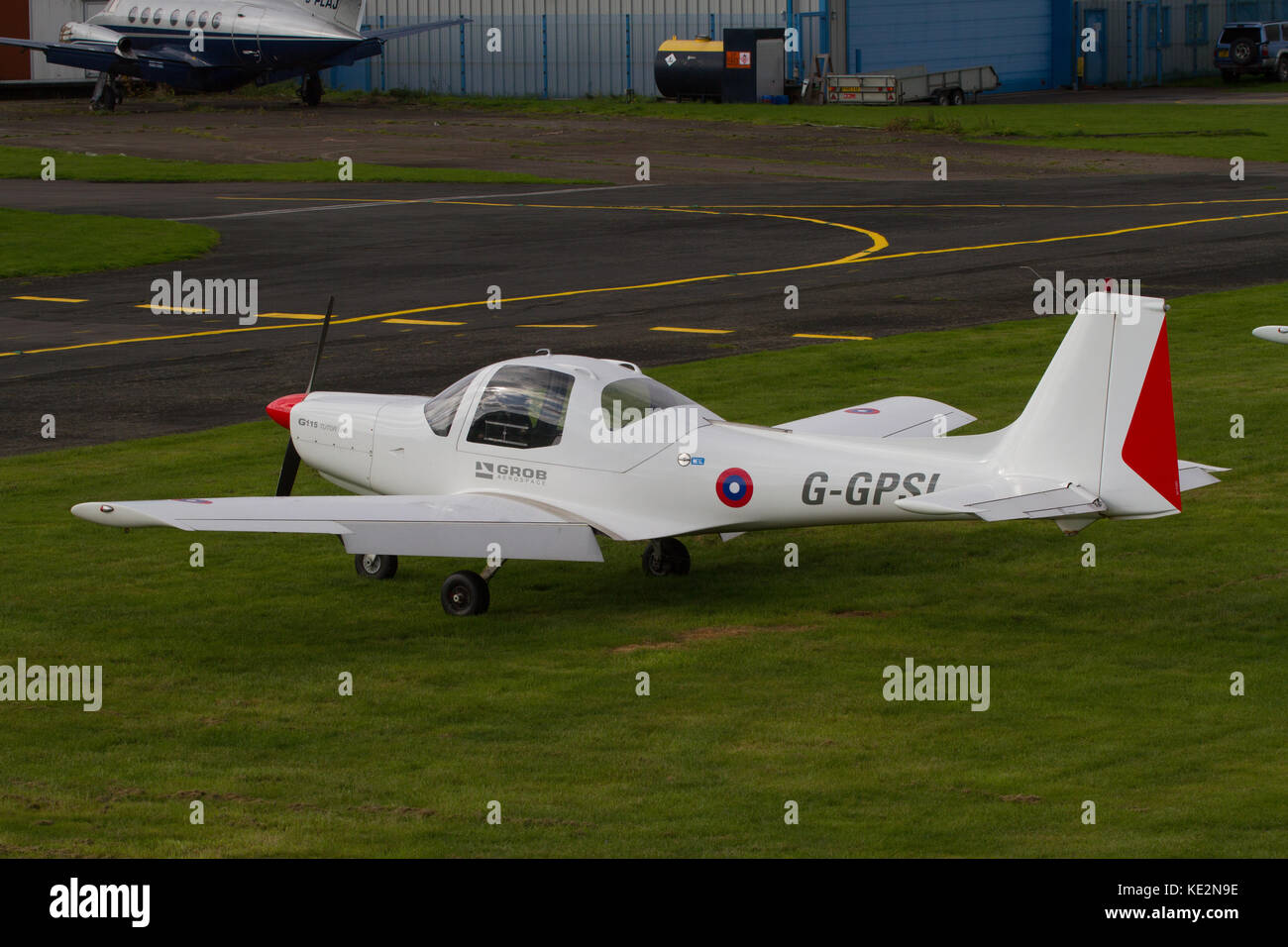 Single Wolverhampton Halfpenny Green Airfield. Staffordshire. UKengined light aircraft parked on grass at Stock Photo