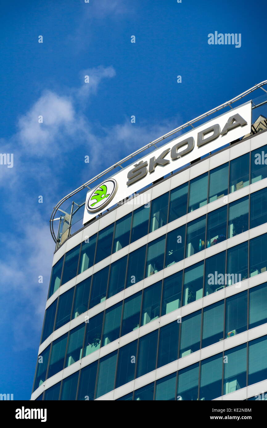PRAGUE, CZECH REPUBLIC - OCTOBER 14: Skoda Auto automobile manufacturer from Volkswagen Group company logo in front of dealership building on October  Stock Photo