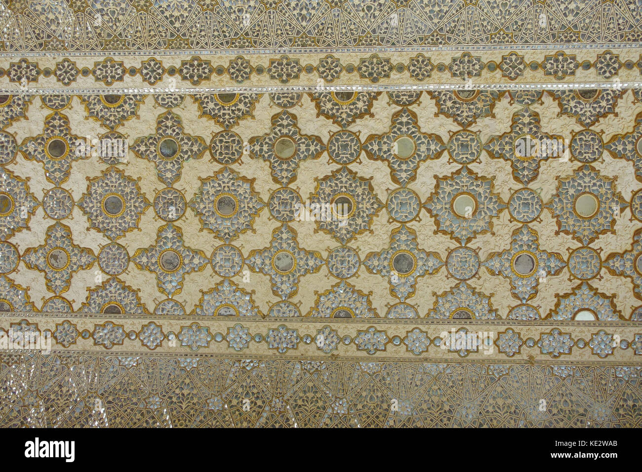 Ancient carved flower on marble and mirrors in Hall of thousands