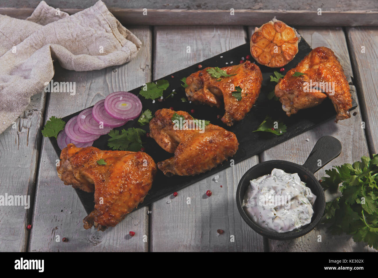 fried chicken wings with sauce Stock Photo - Alamy
