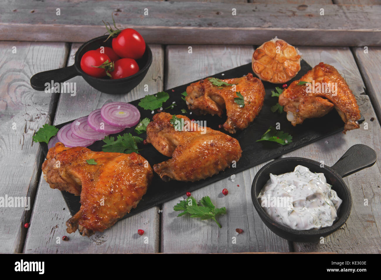fried chicken wings with sauce Stock Photo - Alamy