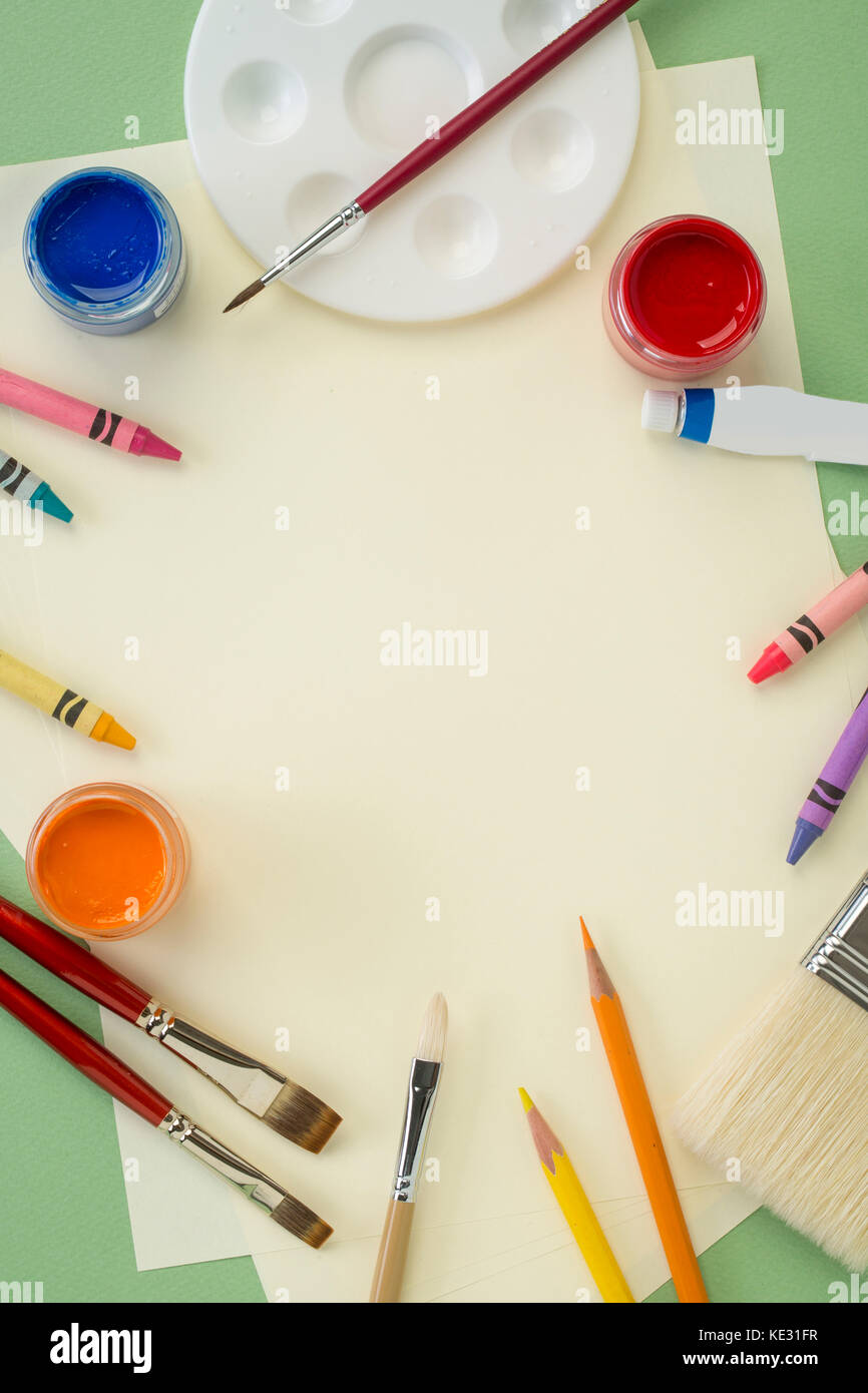 Various art supplies such as paintbrushes and crayons Stock Photo - Alamy