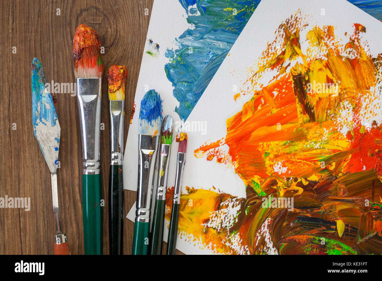 Background of art with mixed oil paints and brushes Stock Photo Alamy