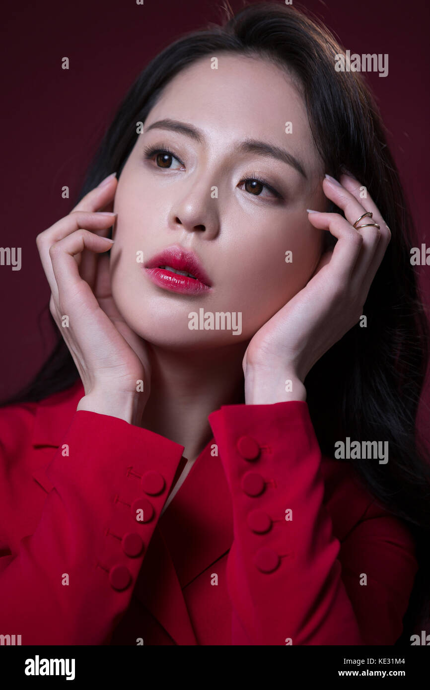 Woman red lipstick thinking hi-res stock photography and images - Alamy
