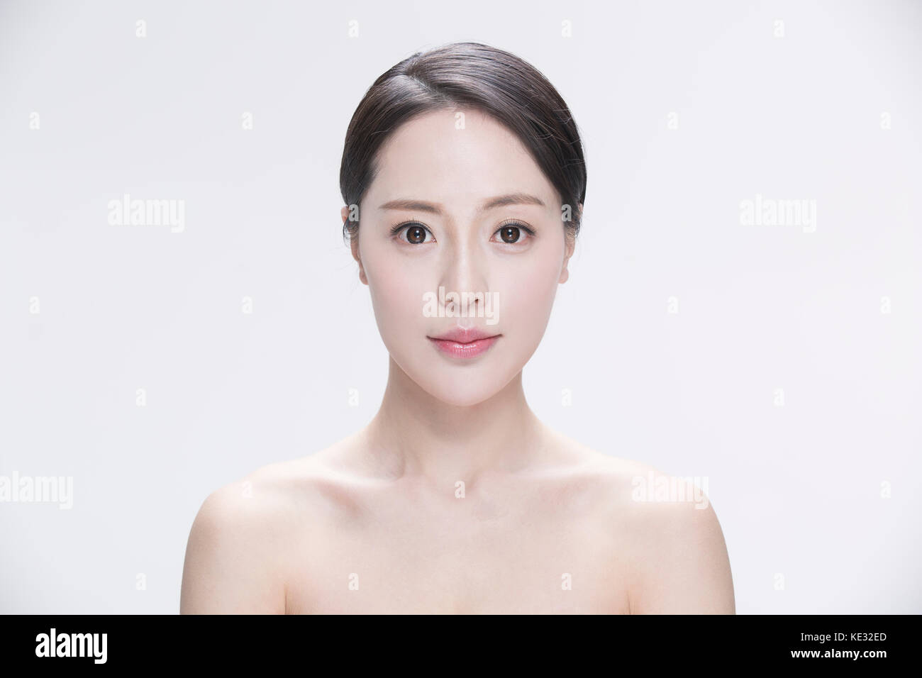 Portrait of young smiling woman Stock Photo - Alamy