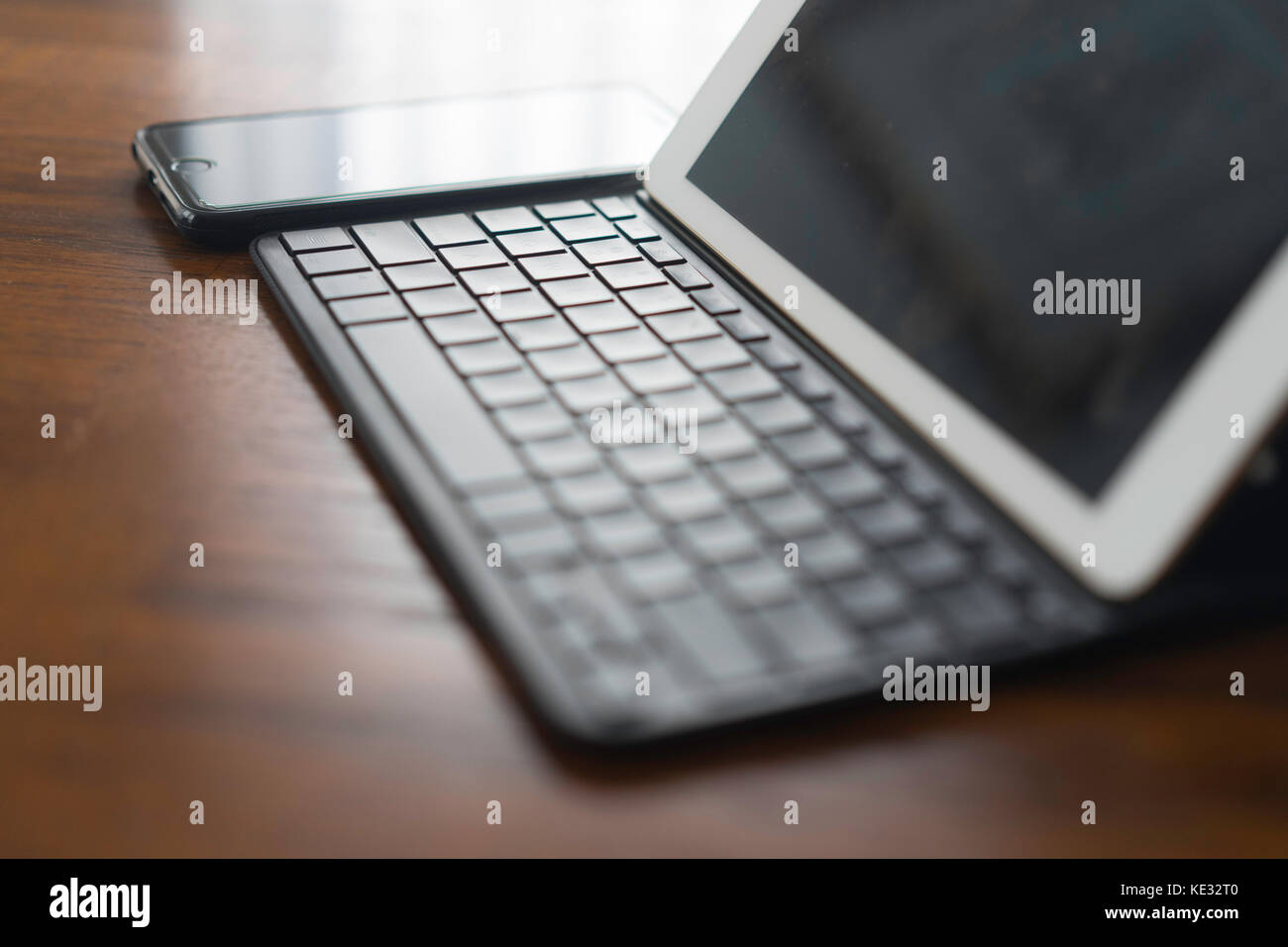 Home office with Gadgets - Tablet and Cell Phone Stock Photo