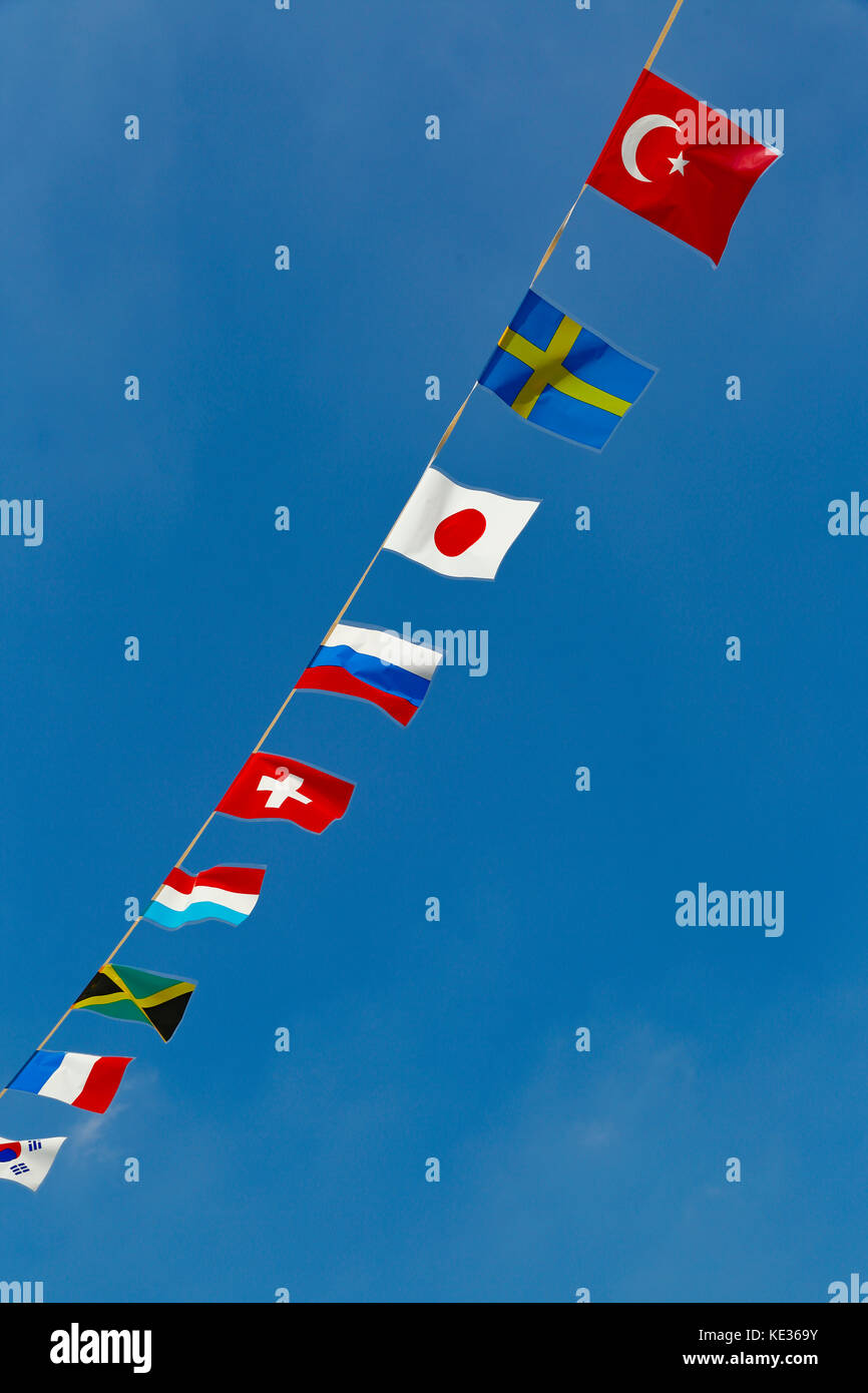 National flags and blue sky Stock Photo - Alamy
