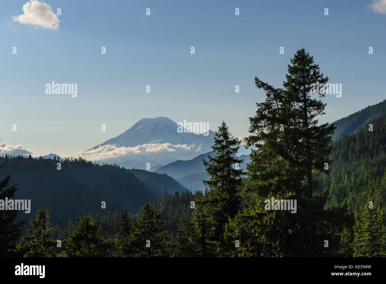 Mount Rainier shrouded in Clouds Stock Photo - Alamy