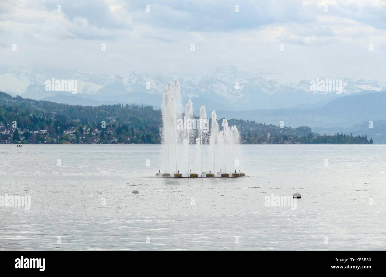 riparian scenery with water fountain at Lake Zurich in Switzerland Stock Photo Alamy