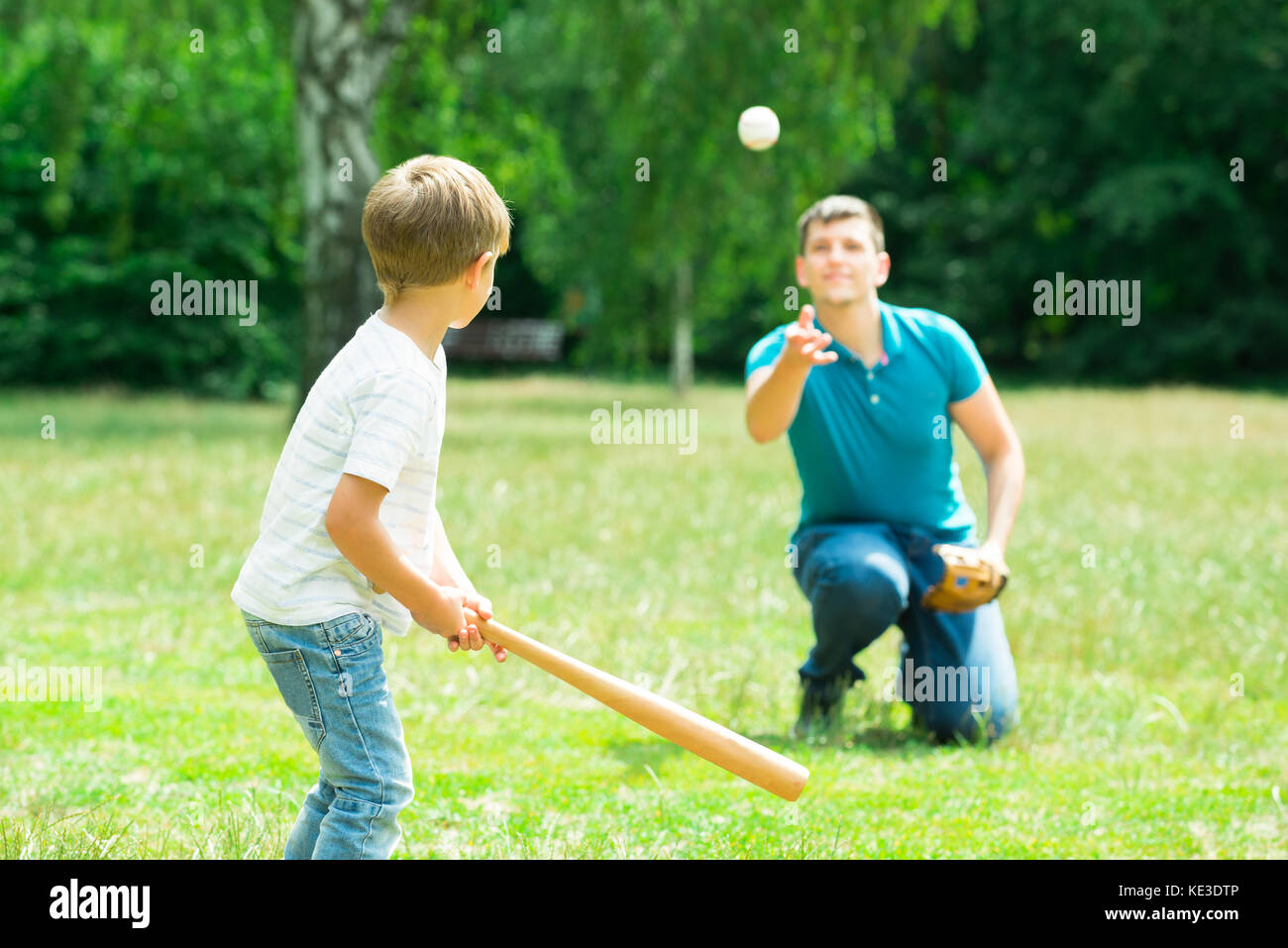 Little boy playing baseball hires stock photography and images Alamy