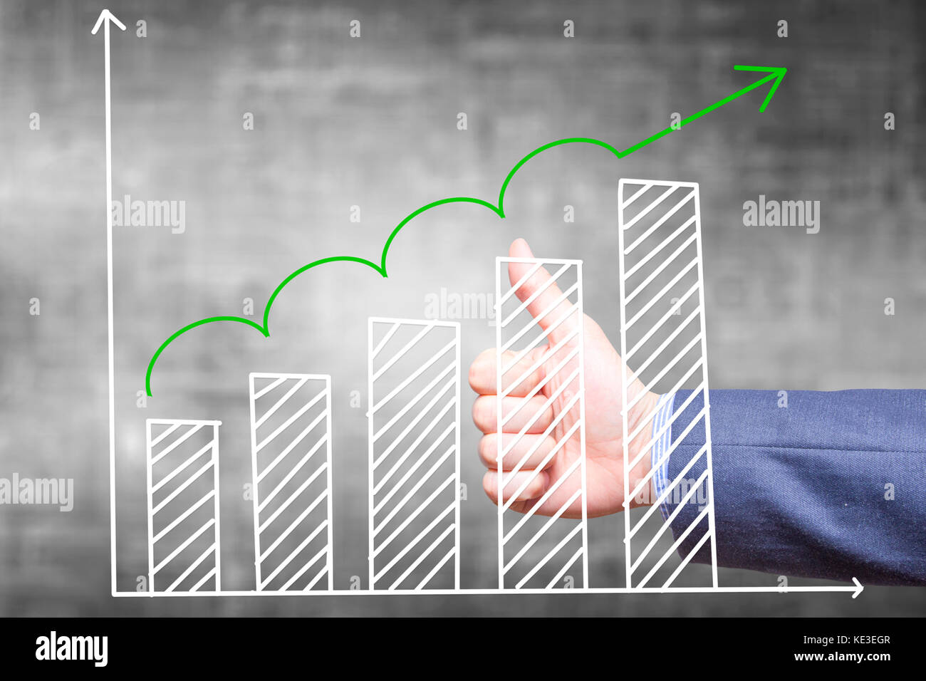 Businessman is satisfied with Growth Graph. Sales concept. Thumbs Up ...