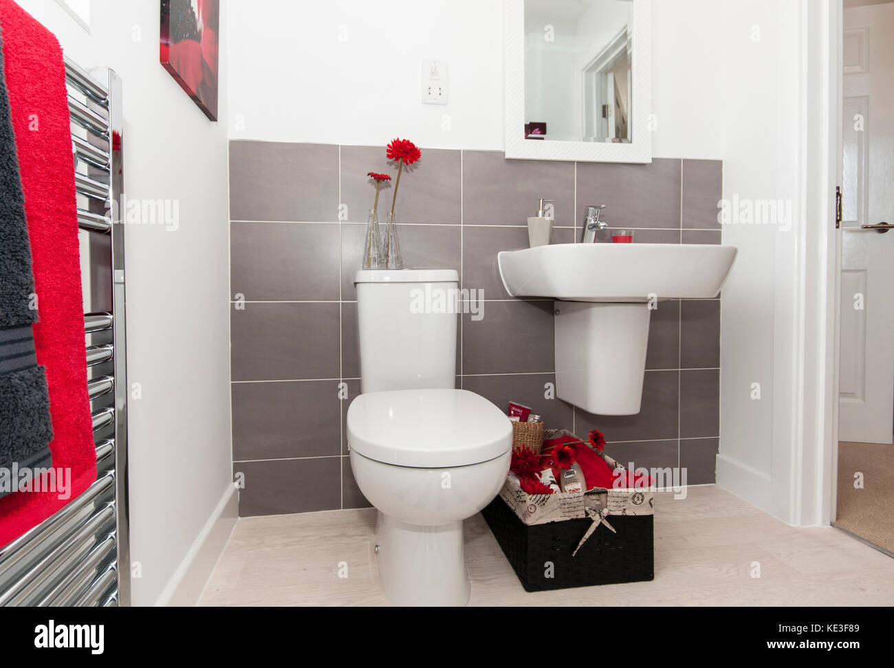 En suite bathroom with chrome towel radiator Stock Photo Alamy