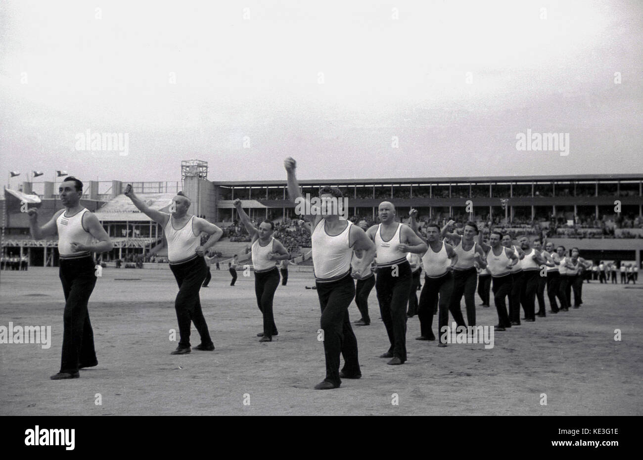 1938. historical, sport, male participants at the massive Strahov Stadium, Prague, Czechoslovakia taking part in the Pan-Sokol International Slet festival. Stock Photo