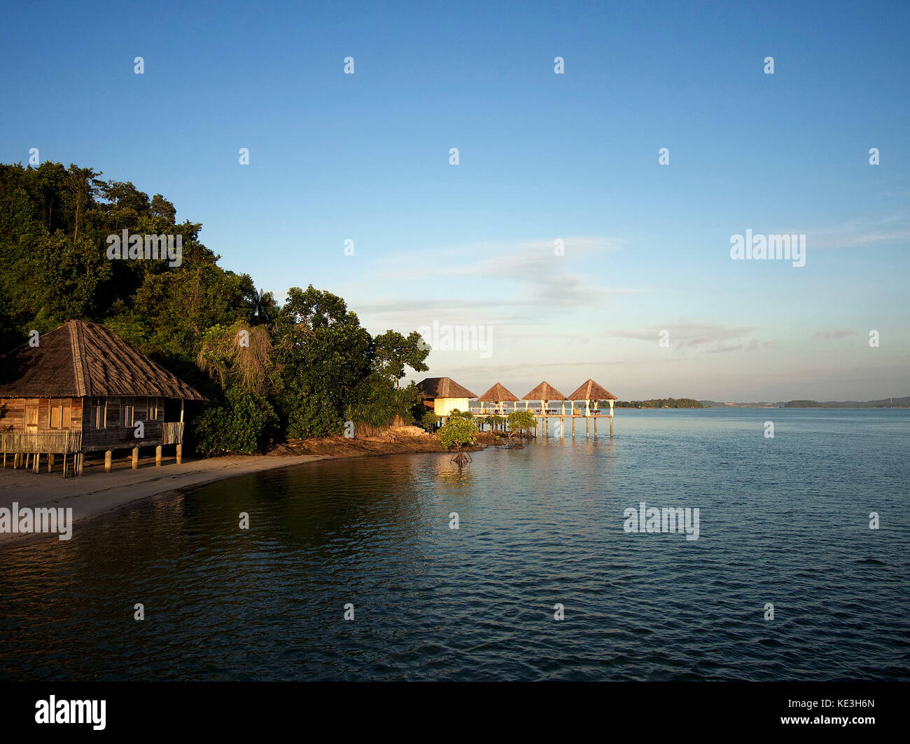 Over the water massage pavillions at Telunas Private Island Resort, in the Riau Islands, Indonesia, in the morning Stock Photo