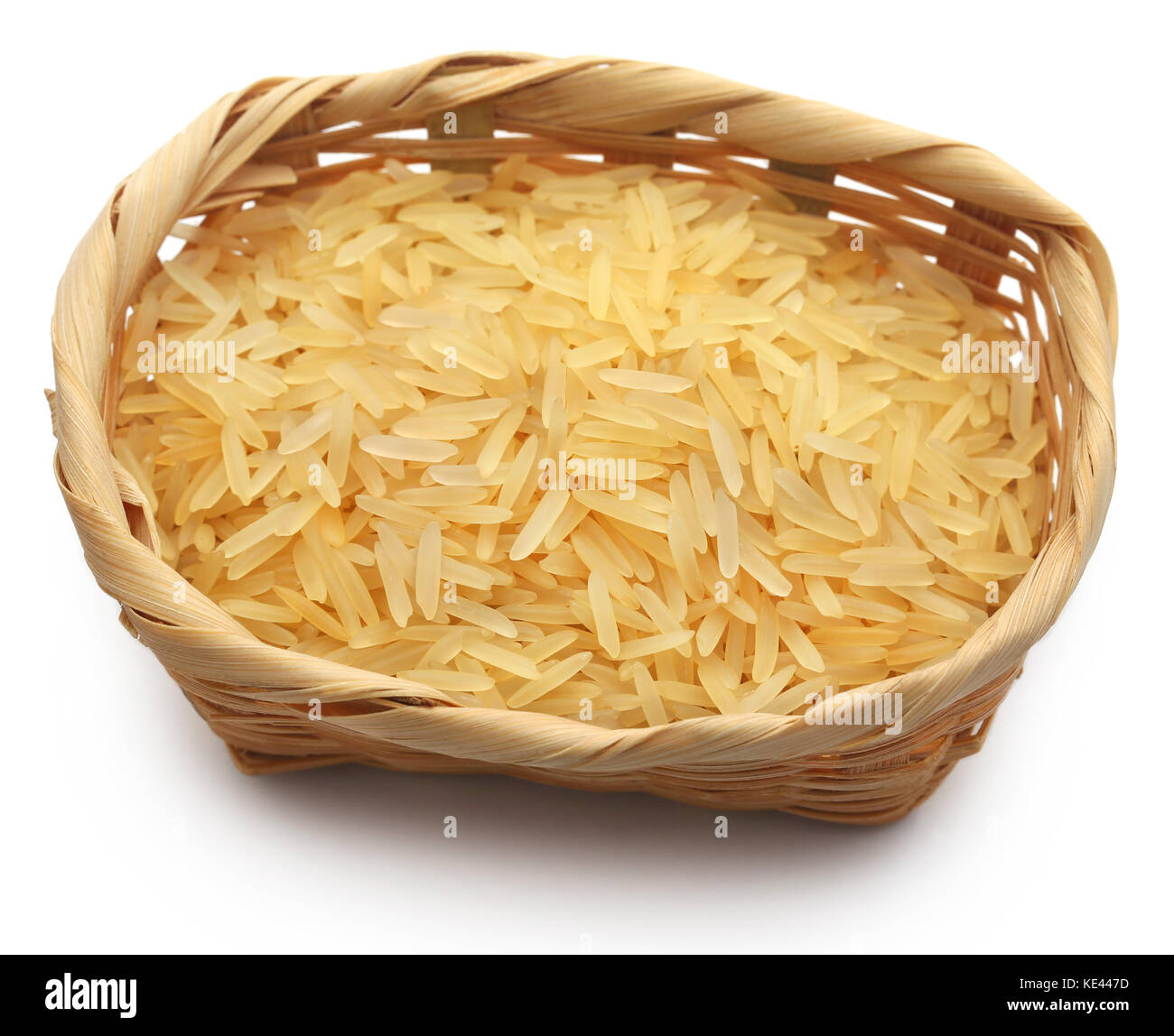Basmati rice uncooked in a bowl over white background Stock Photo Alamy