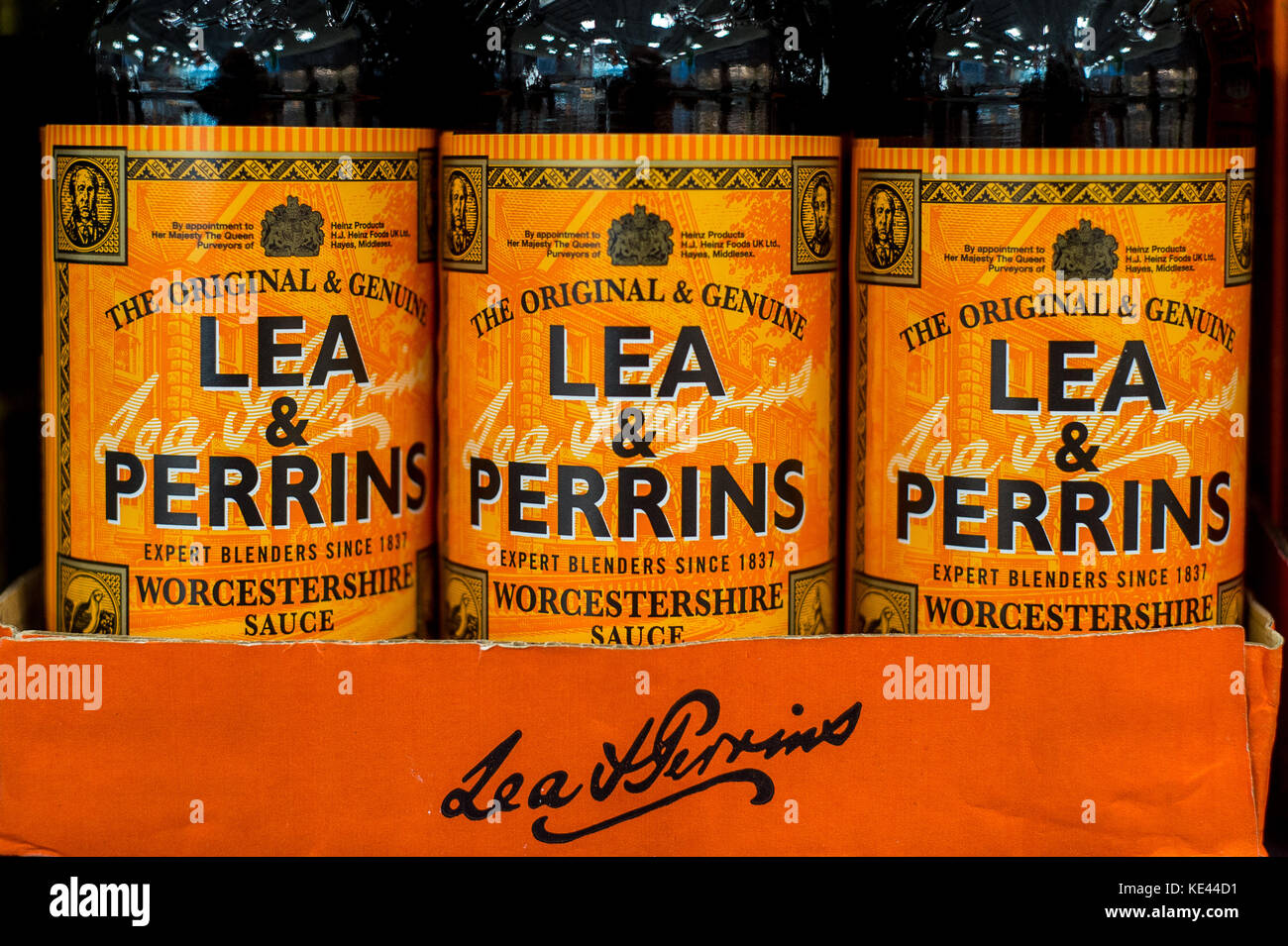 Lea and Perrins Worcester sauce stacked own the shelf in a UK Supermarket Stock Photo