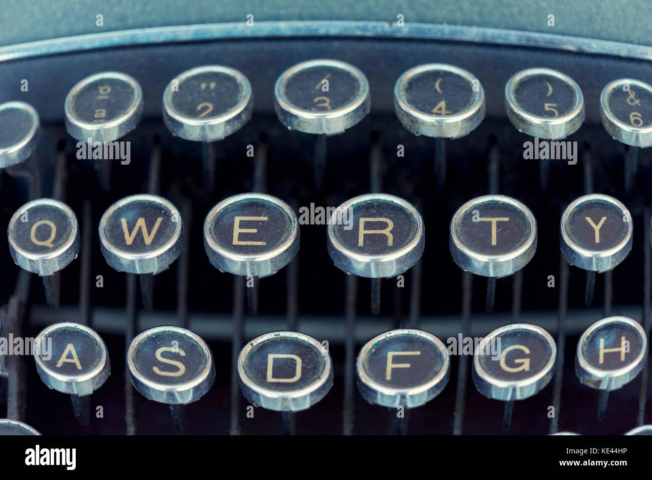Closeup horizontal shot of a dusty obsolete typewriter with qwerty