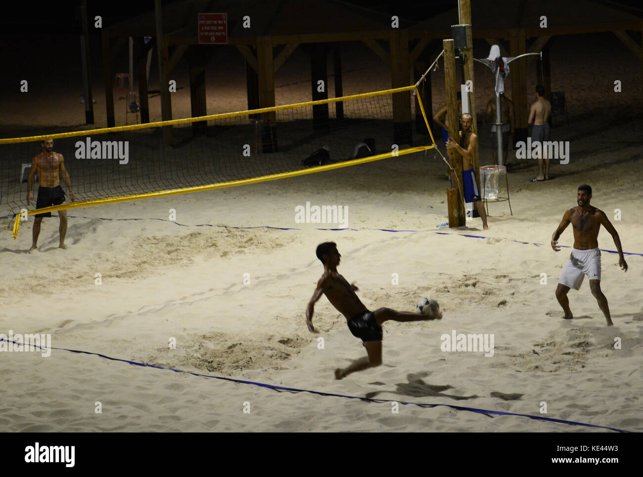 A Footvolley game on the beach in Tel-Aviv Stock Photo - Alamy