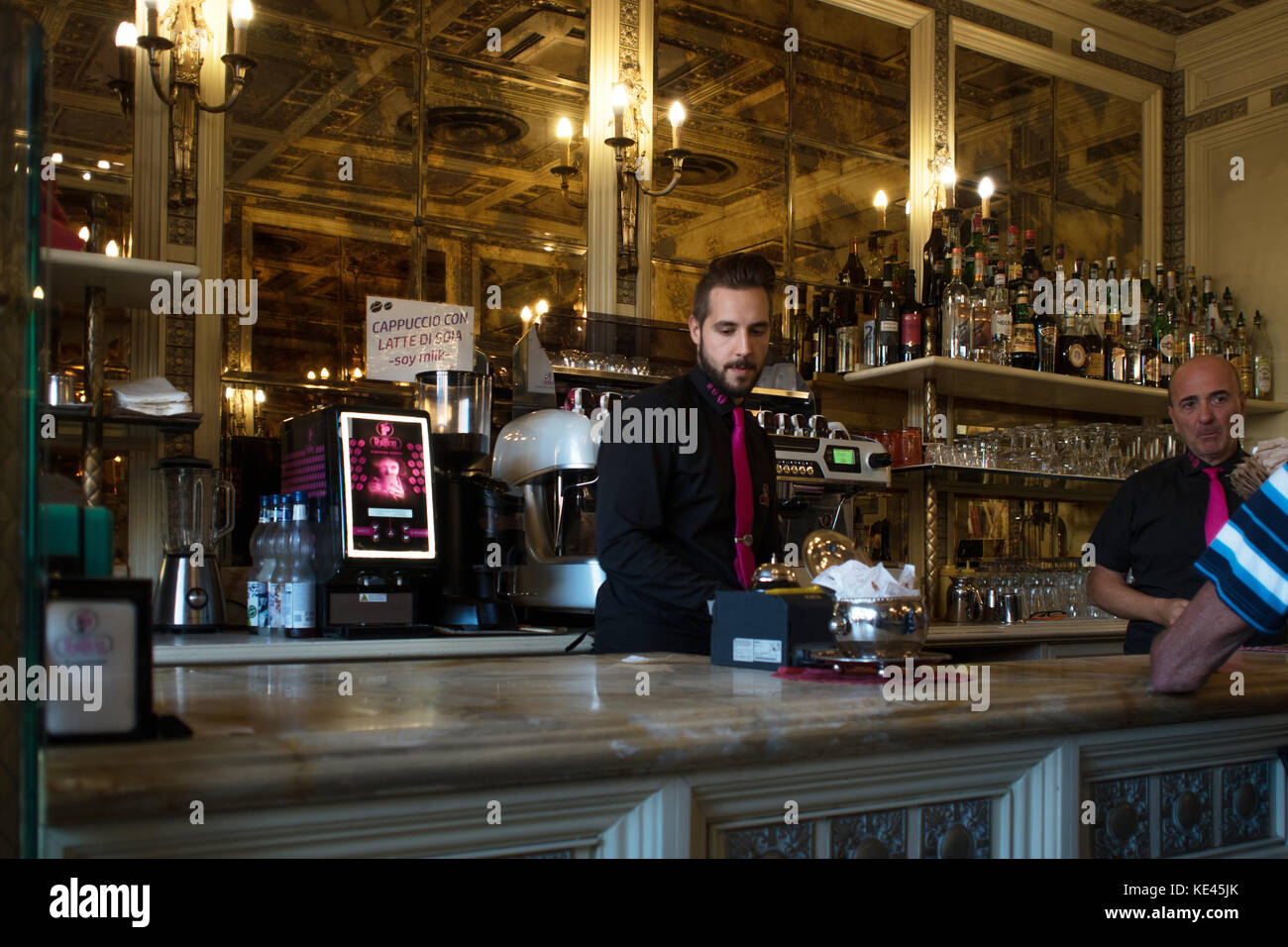 MILAN, ITALY OCTOBER 8 , 2017 Buying coffee and a sandwich at the