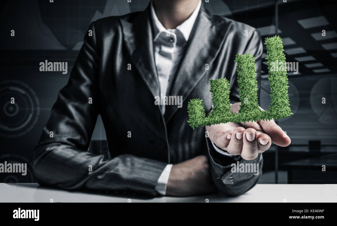 Businessman presenting growing graph Stock Photo - Alamy
