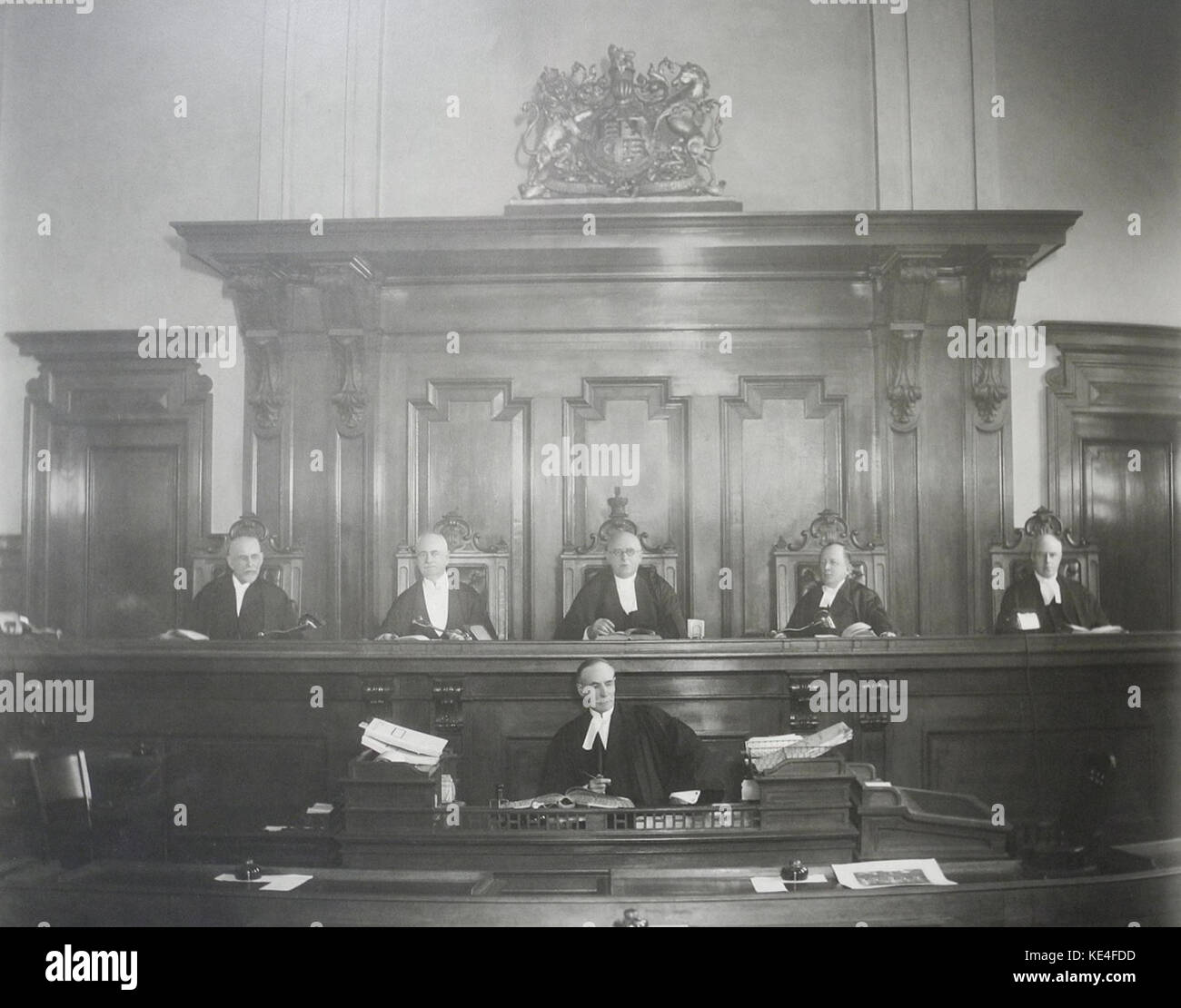 This photograph features the justices of the Supreme Court of Ontario, capturing a moment in the judicial history of the Canadian province. The image showcases the formal attire and setting of the judicial figures. Stock Photo