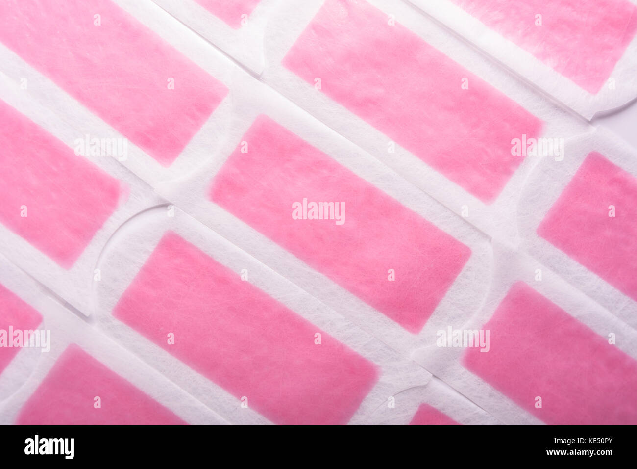 Hair removal wax strip. Depilation body hair background Stock Photo Alamy