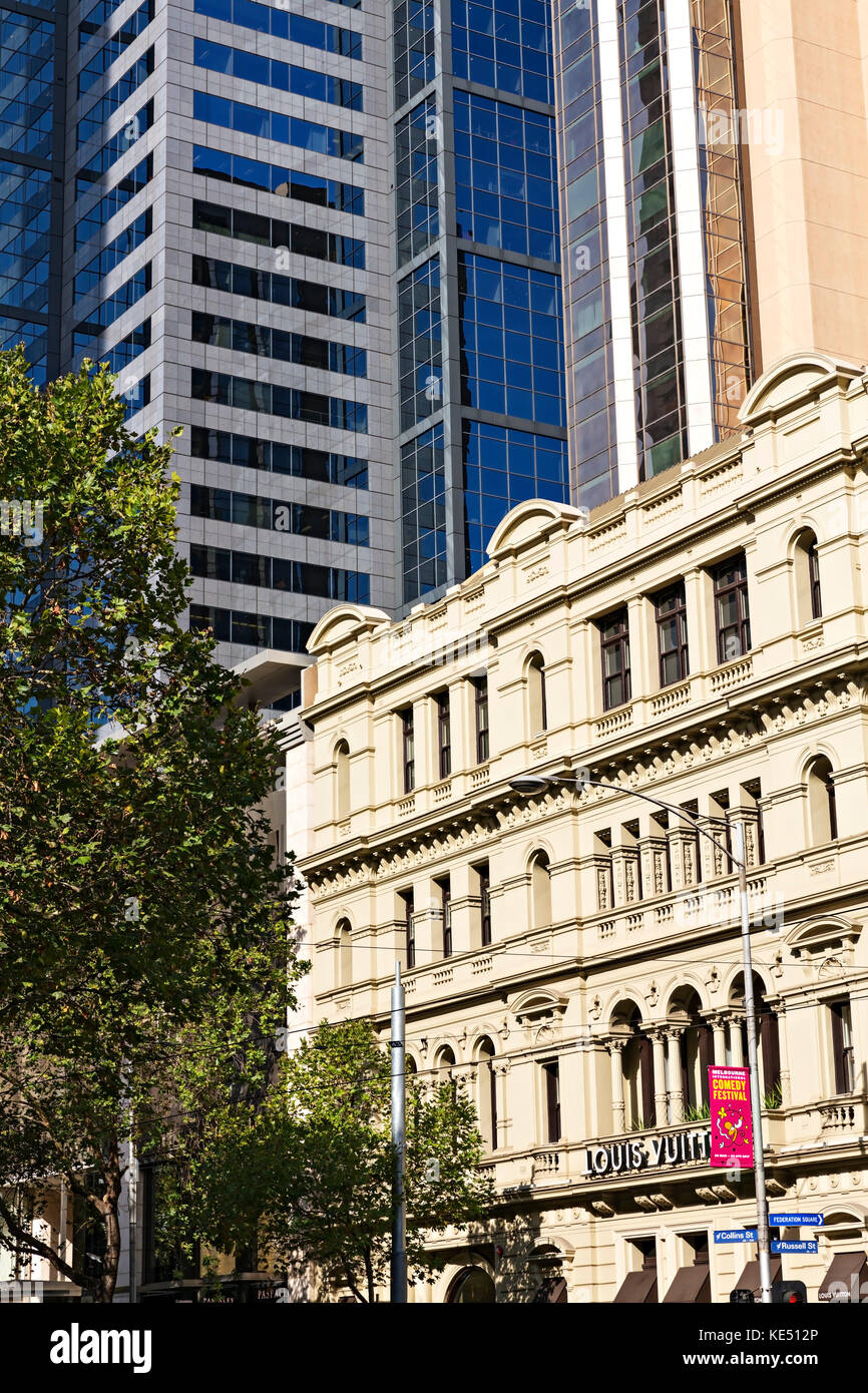 The Victorian era building circa 1886 in the foreground,contrasts with the modern skyscrapers seen background in Collins Street Melbourne Australia. Stock Photo