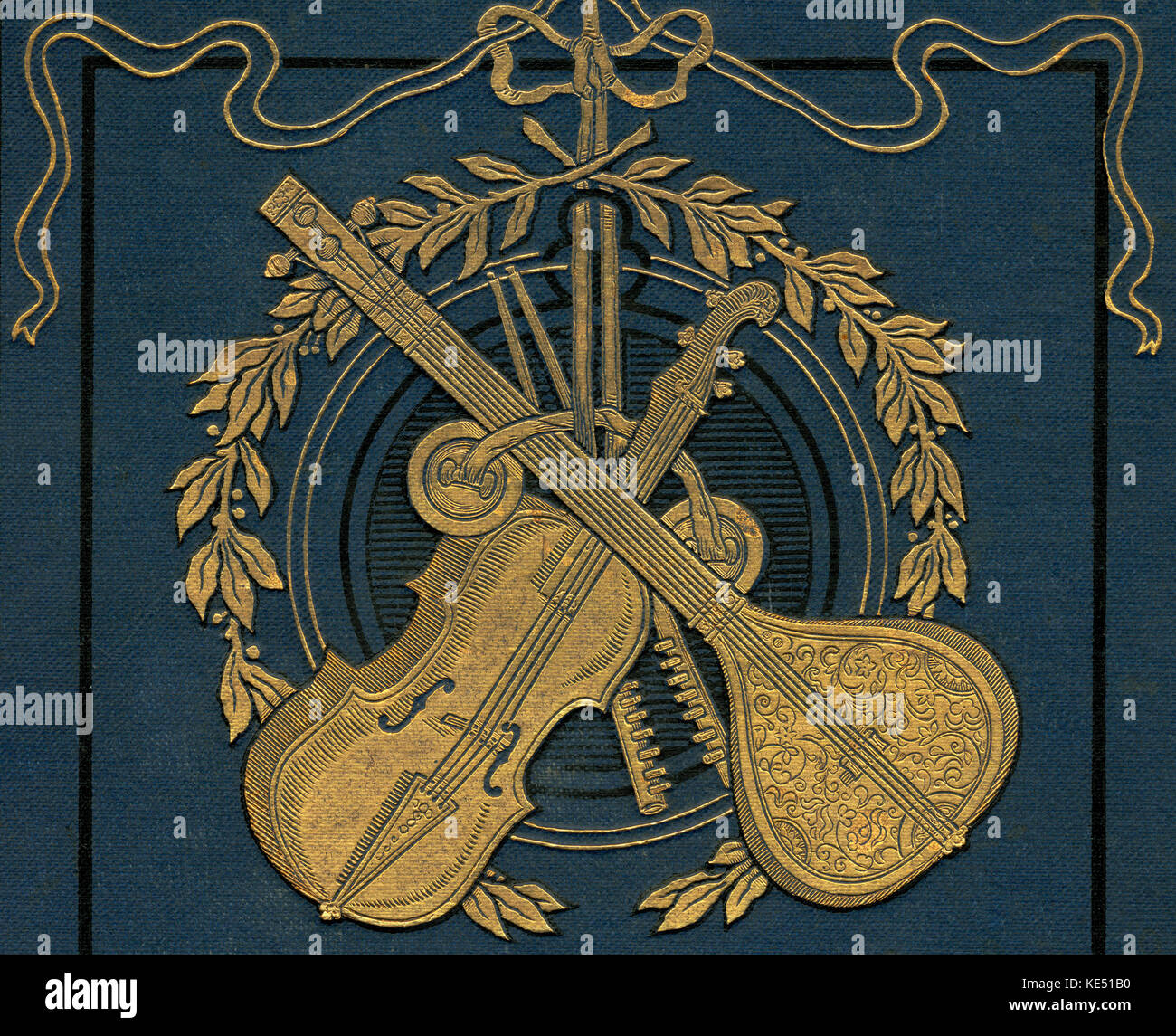 Decorative book cover with mandolin and violin and cithara. Golden / gilt engravings. Stock Photo