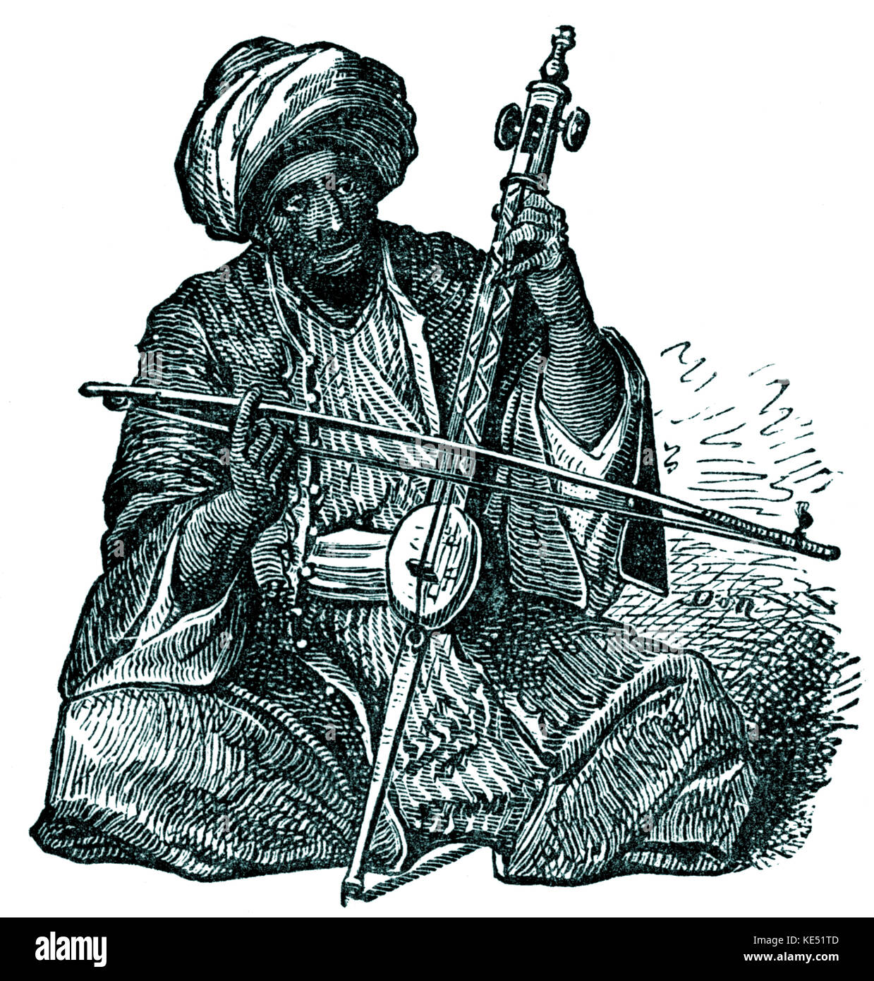 Kemengeh (or Kemangeh) - performer on the ancient Middle Eastern string instrument. Drum - shaped resonance body made from the shell of a cocoa - nut. Neck of ebony. Stock Photo