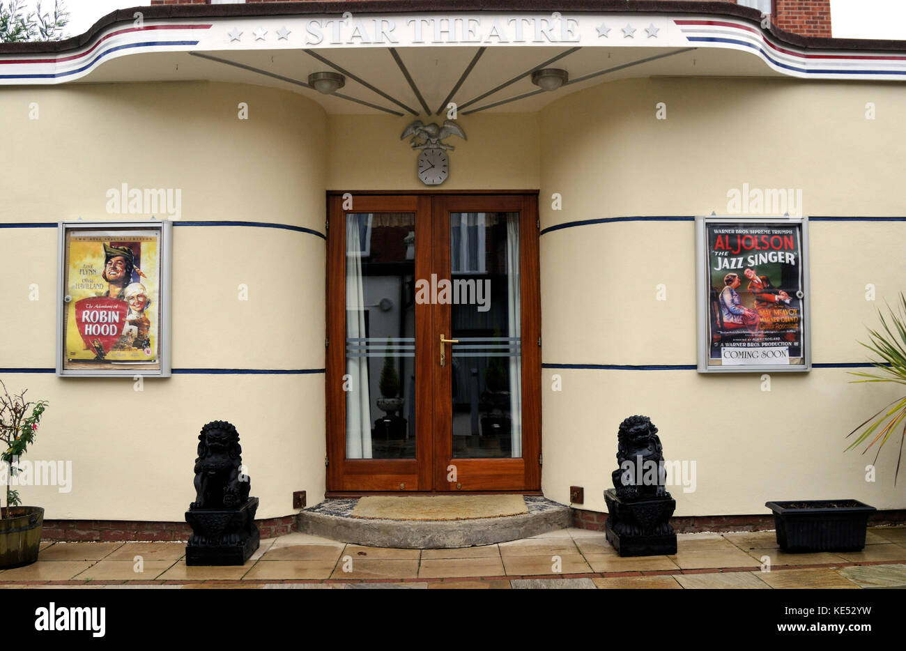 Private cinema exterior  Built in 1920s, early 1930s style.  White walls, located in London suburban garden. Stock Photo