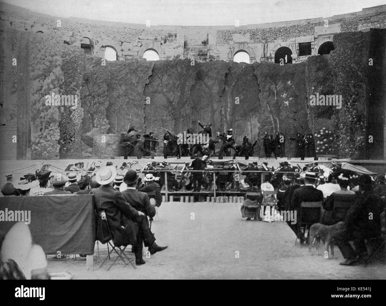 Amphitheatre at Nimes playing Mefistofele, Act II,  Scene 4.-  La nuit du sabbat infernal dans le Brocken  by A. Boito Stock Photo