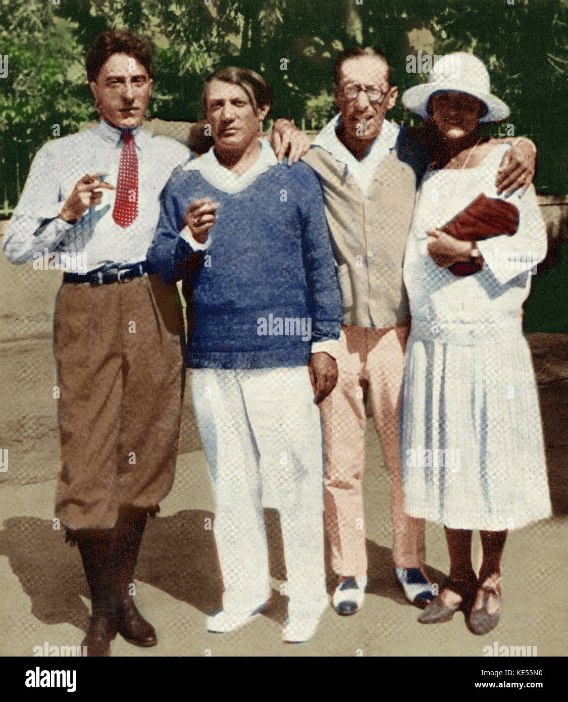 Igor Stravinsky with Cocteau and Picasso in Antibes 1926 from l to r. Jean Cocteau, Pablo Picasso, Igor Stravinsky & Olga Picasso. Associated with the Ballet Russe de Diaghilev. Colourised version. Stock Photo