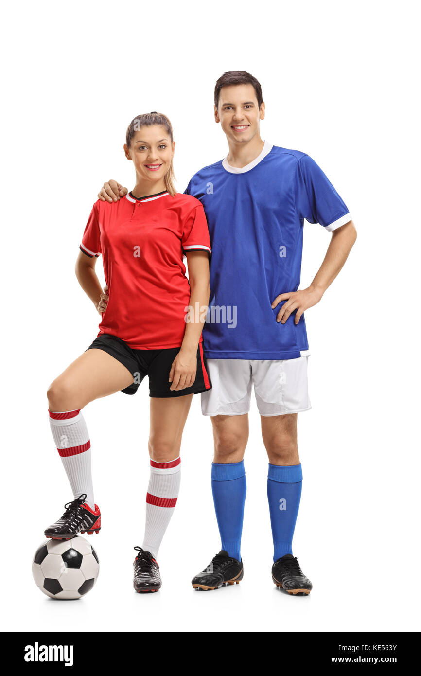 Full length portrait of a female and a male footballer isolated on white background Stock Photo
