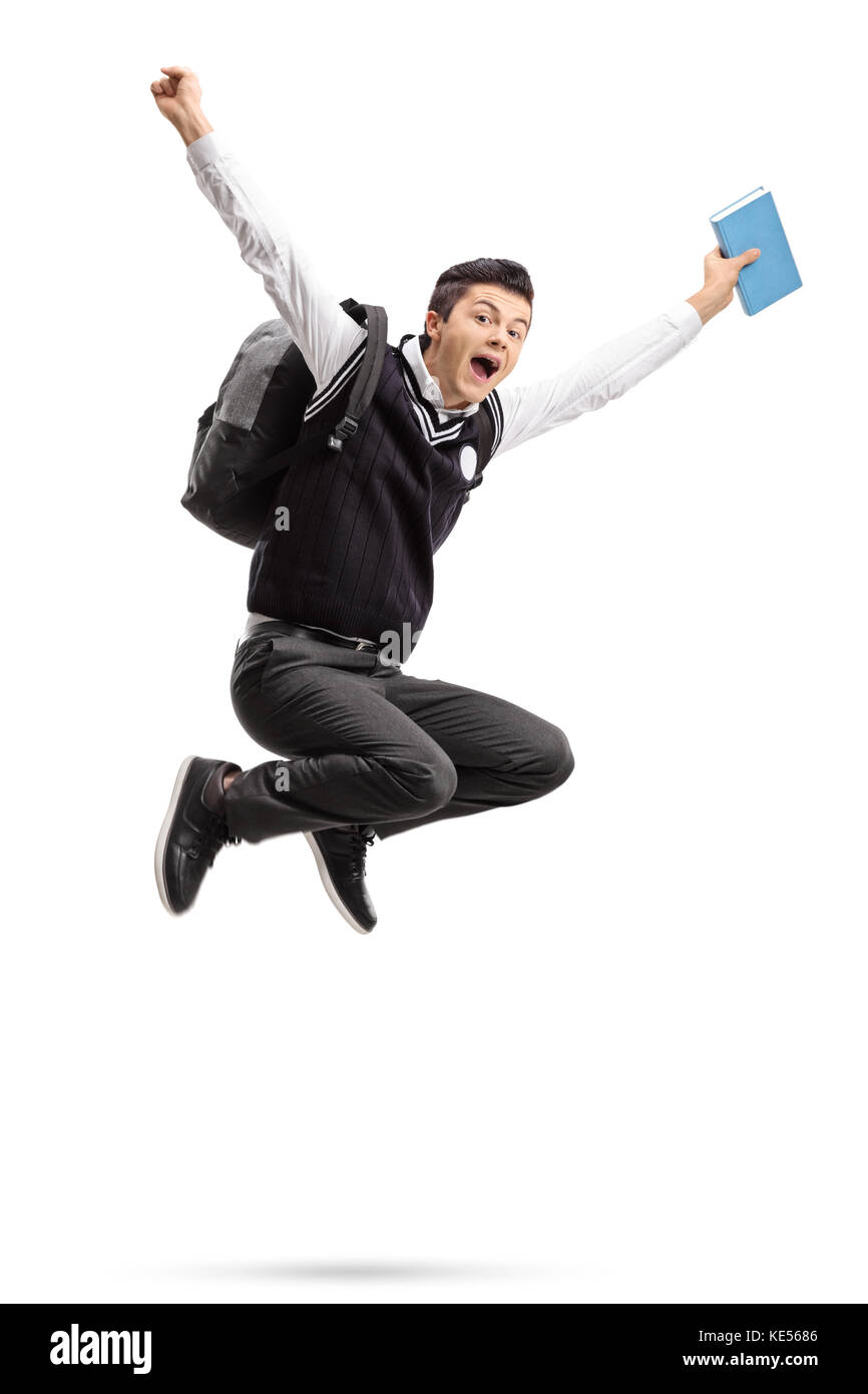 Overjoyed teenage student with a backpack and a book jumping isolated ...